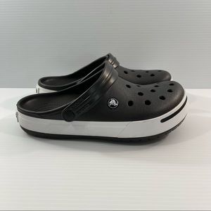 Crocs slip on.  Black and white. Womens size 9 Mens size 7.